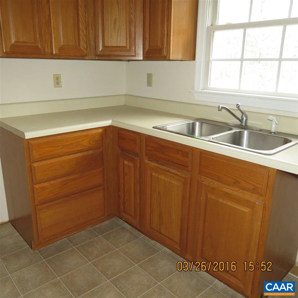 4375 Payne Road Columbia, VA 23038 - Photo 8 of 20 a kitchen with a sink and cabinets