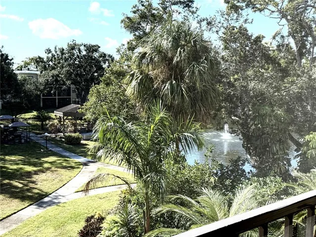 a view of swimming pool from a lake view