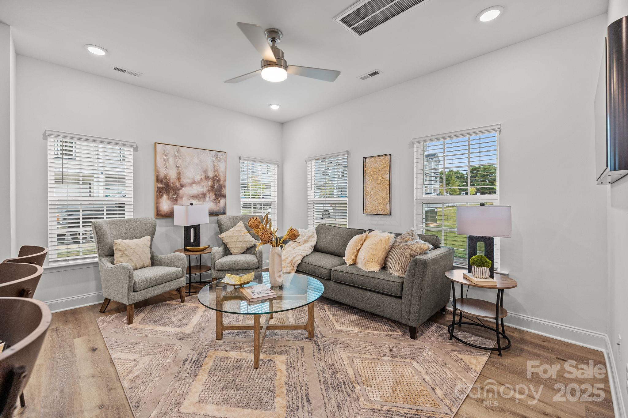 5025 Cherry Gum Court, Unit 47 Matthews, NC 28105 - Photo 8 of 27 a living room with furniture and a large window