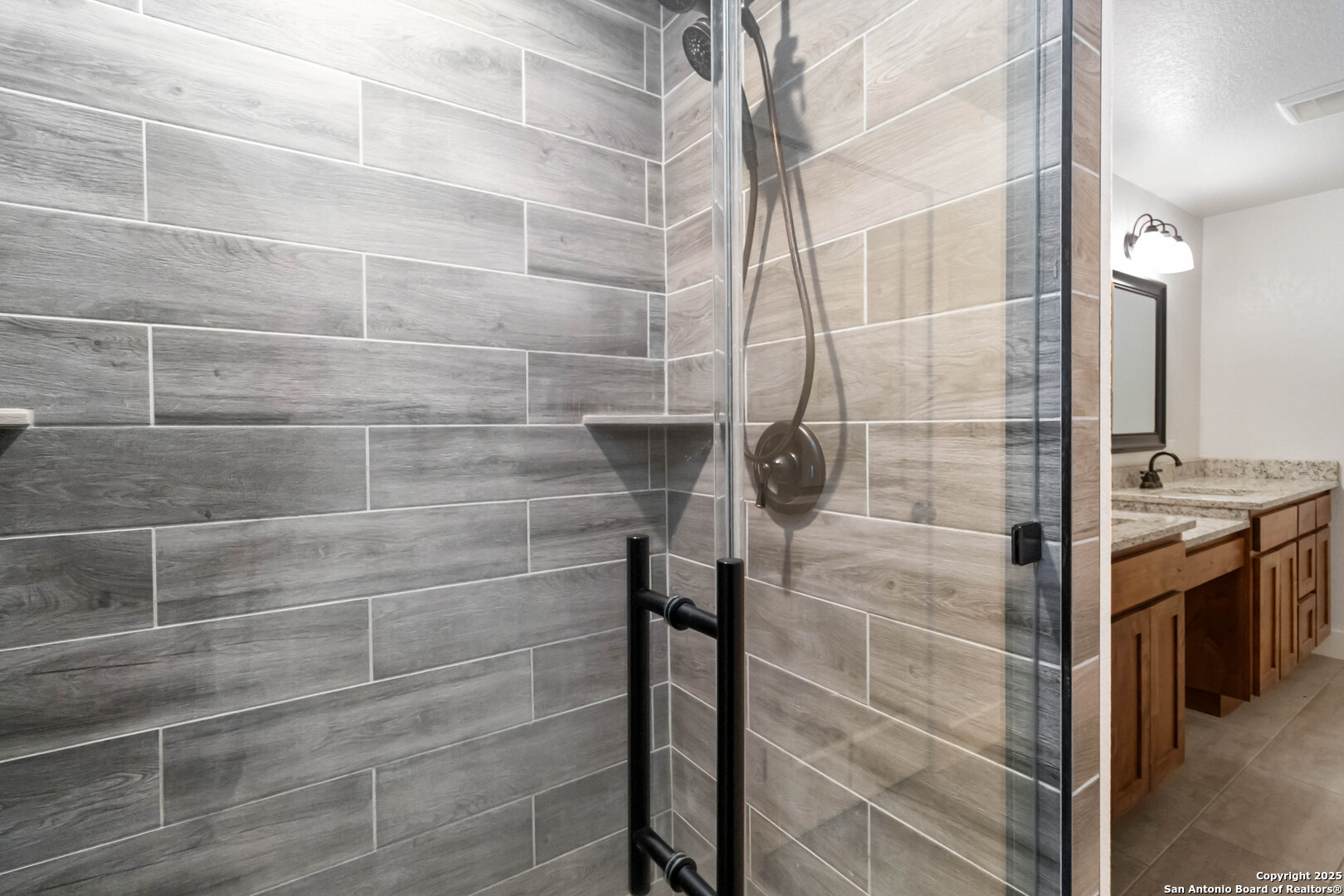 188 Old Camp Road Bandera, TX 78003 - Photo 15 of 36 a bathroom with a shower