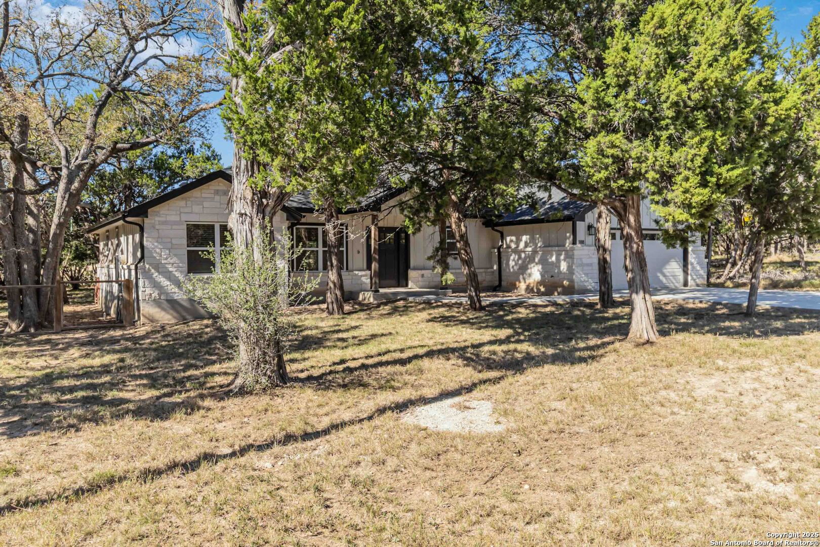 188 Old Camp Road Bandera, TX 78003 - Photo 2 of 36 a view of a house with snow on the ground