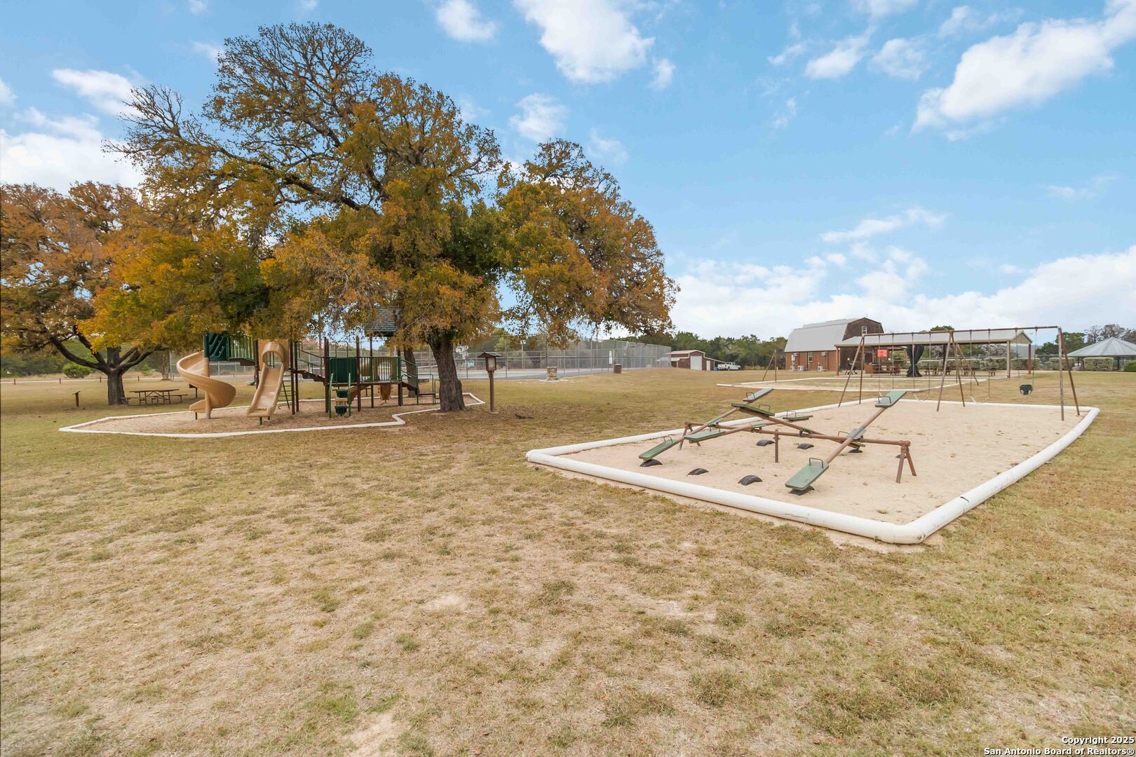 188 Old Camp Road Bandera, TX 78003 - Photo 27 of 36 a view of a lake with houses