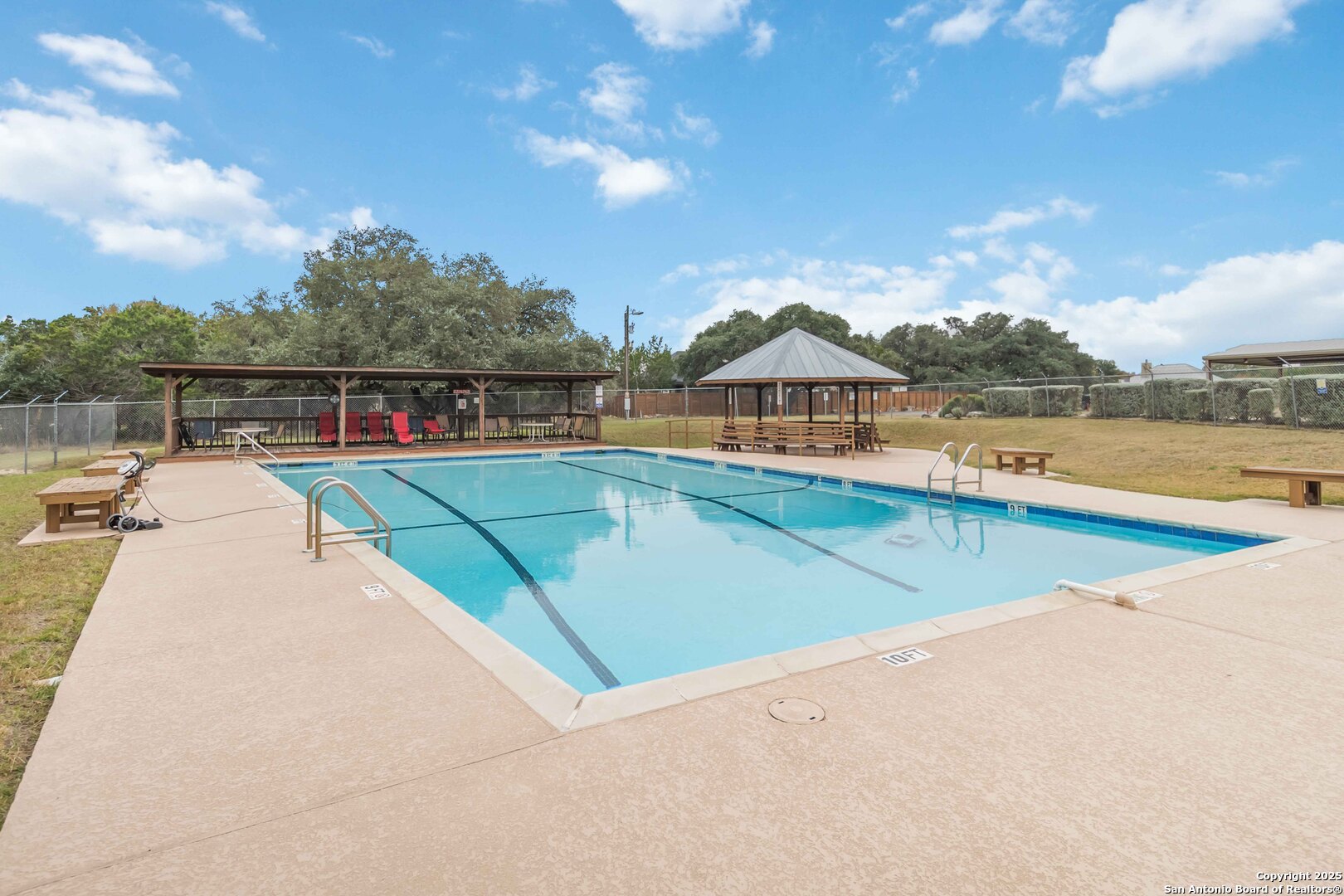 188 Old Camp Road Bandera, TX 78003 - Photo 32 of 36 a view of swimming pool with a lounge chair