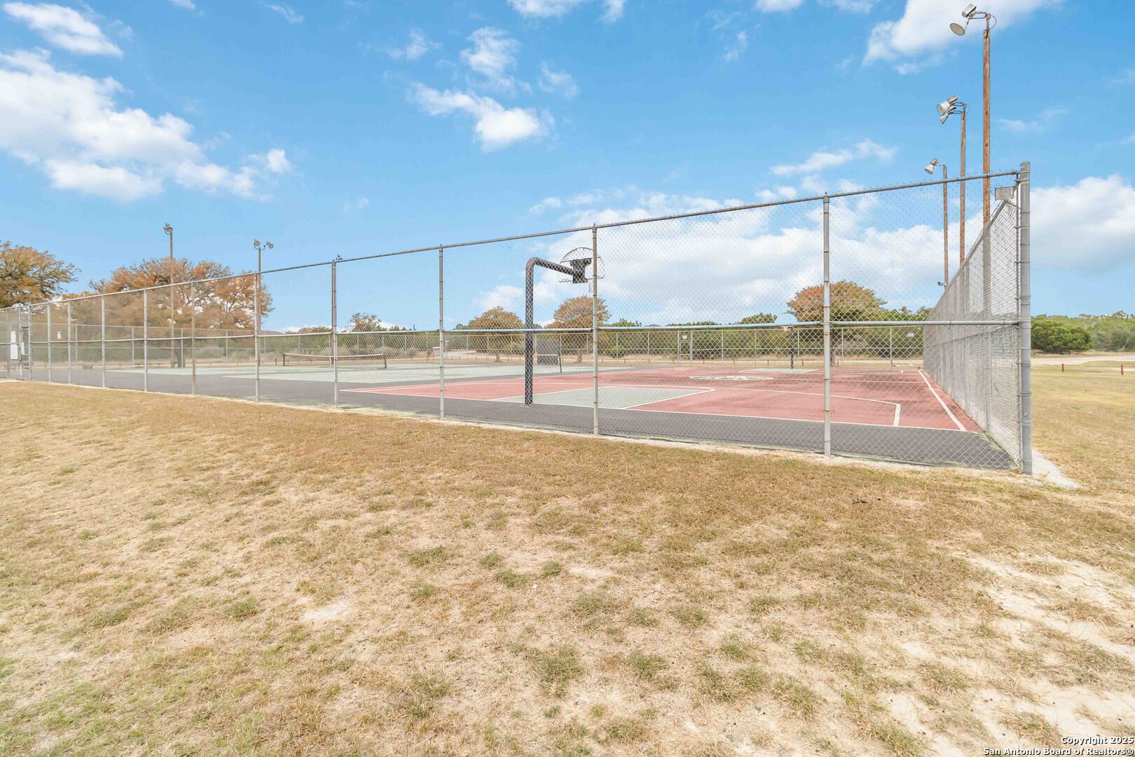 188 Old Camp Road Bandera, TX 78003 - Photo 34 of 36 a view of a indoor basketball court