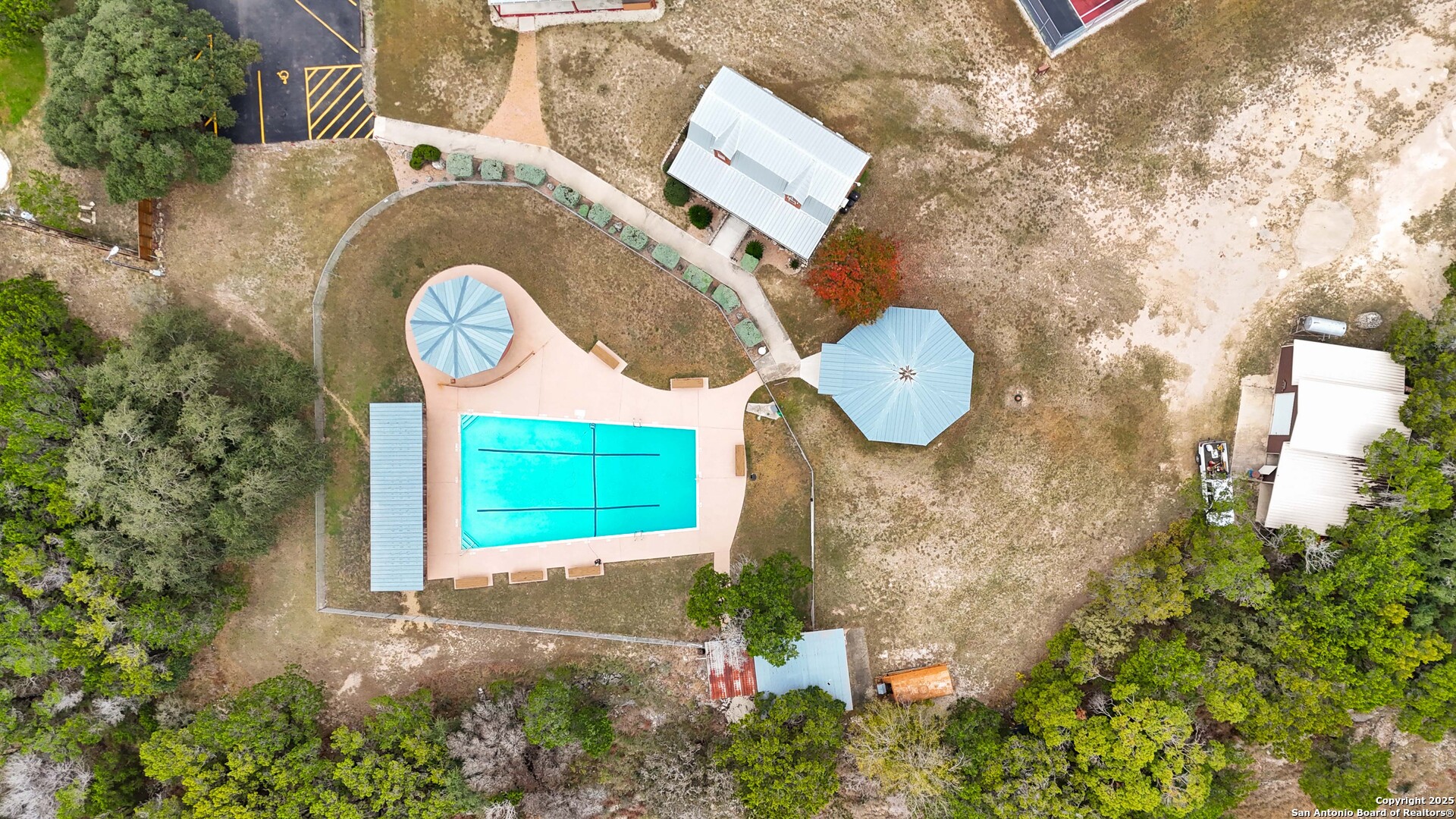 188 Old Camp Road Bandera, TX 78003 - Photo 36 of 36 a sign that is on a brick wall