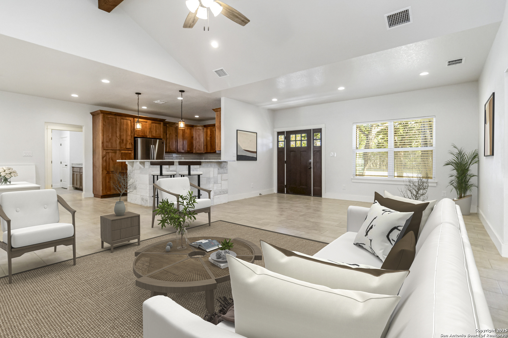 188 Old Camp Road Bandera, TX 78003 - Photo 5 of 36 a living room with furniture and a flat screen tv