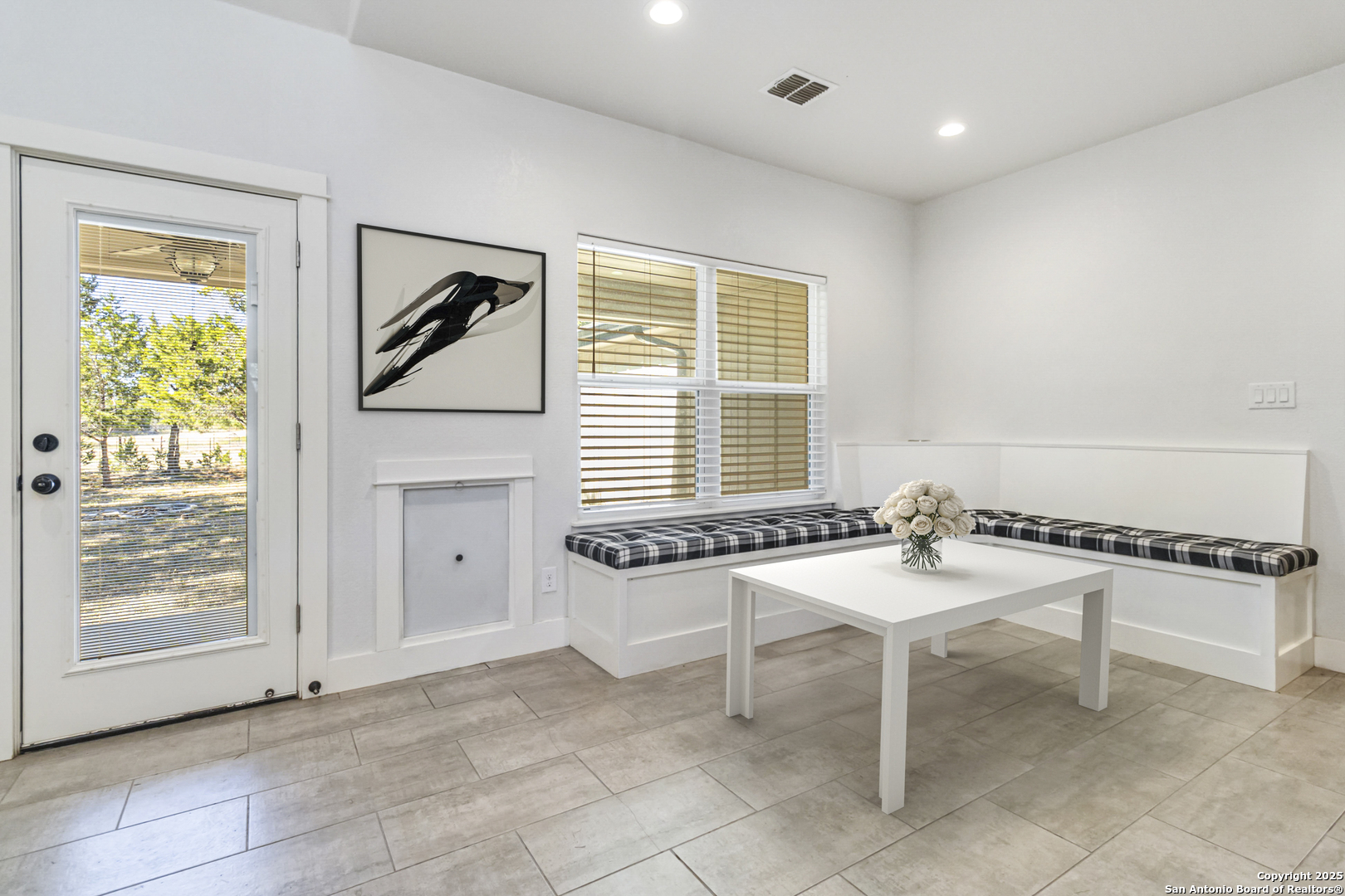188 Old Camp Road Bandera, TX 78003 - Photo 6 of 36 a dining room with furniture and window