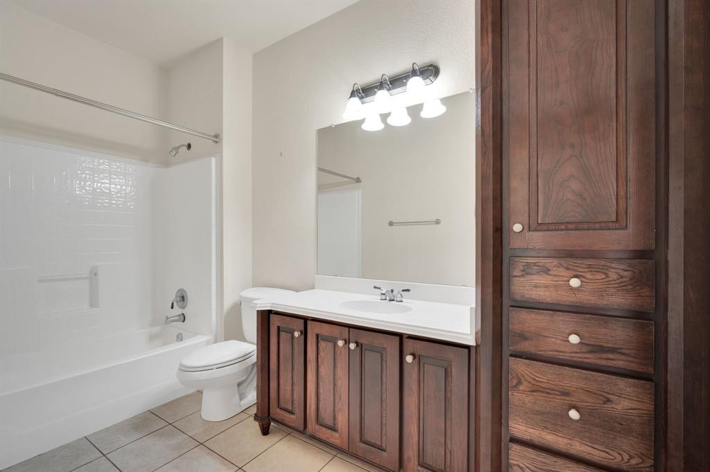 241 Cody Road Ennis, TX 75119 - Photo 22 of 40 2nd bath on 1st floor