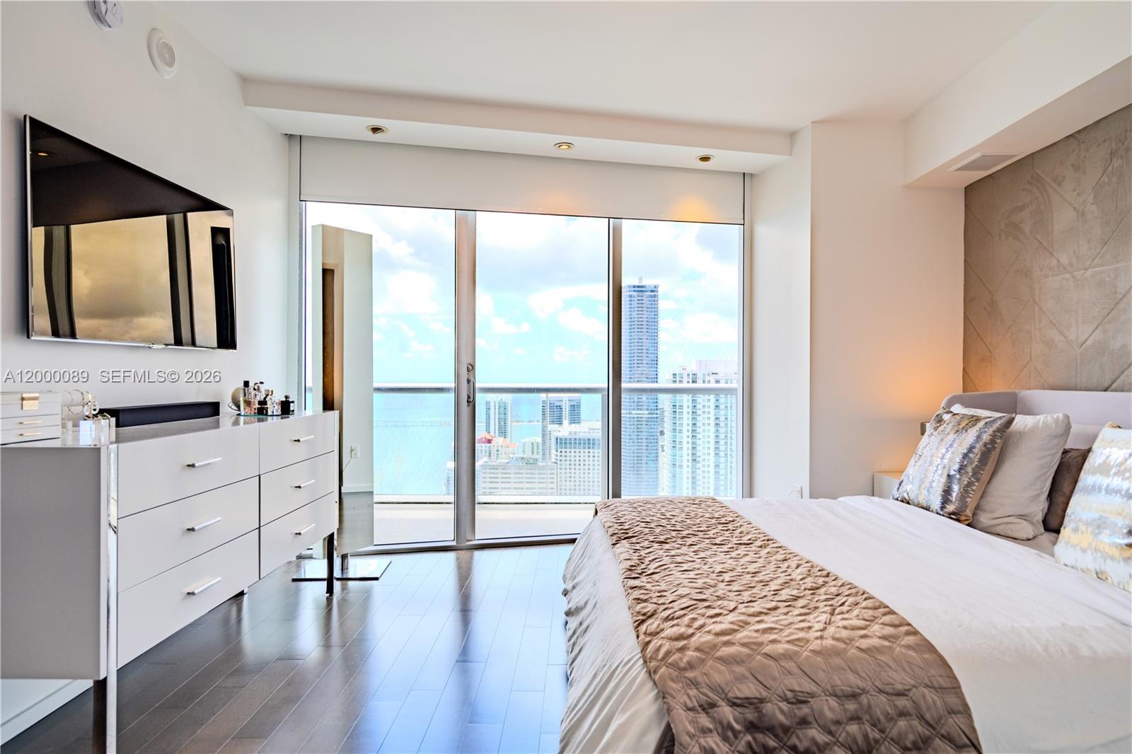 495 Brickell Avenue, Unit PH5703 Miami, FL 33131 - Photo 12 of 52 Master Bedroom with access to balcony