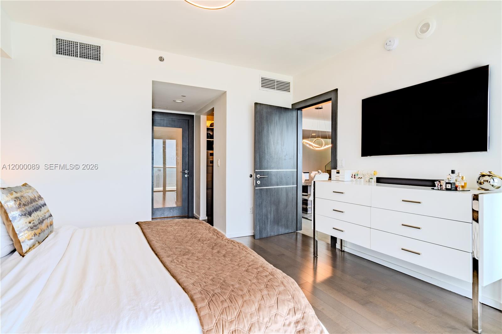 495 Brickell Avenue, Unit PH5703 Miami, FL 33131 - Photo 13 of 52 Master Bedroom with 2 walk-in closets