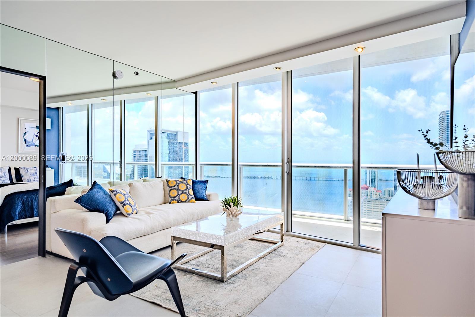 495 Brickell Avenue, Unit PH5703 Miami, FL 33131 - Photo 2 of 52 Open space living with plenty of natural light to open your heart and mind to beautiful Miami ocean views