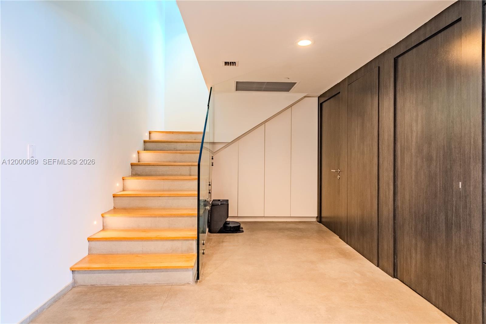 495 Brickell Avenue, Unit PH5703 Miami, FL 33131 - Photo 21 of 52 stairs leading to upper penhouse level