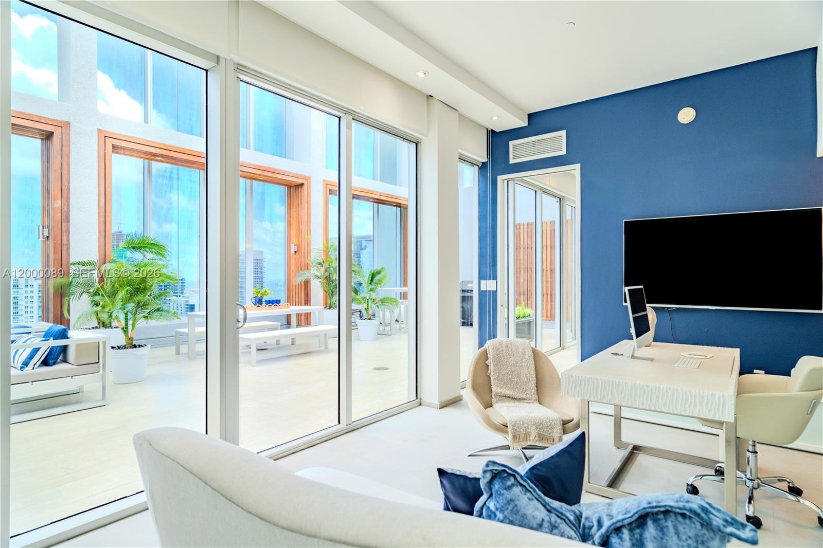 495 Brickell Avenue, Unit PH5703 Miami, FL 33131 - Photo 23 of 52 Upper floor - Office looking to the outside private patio