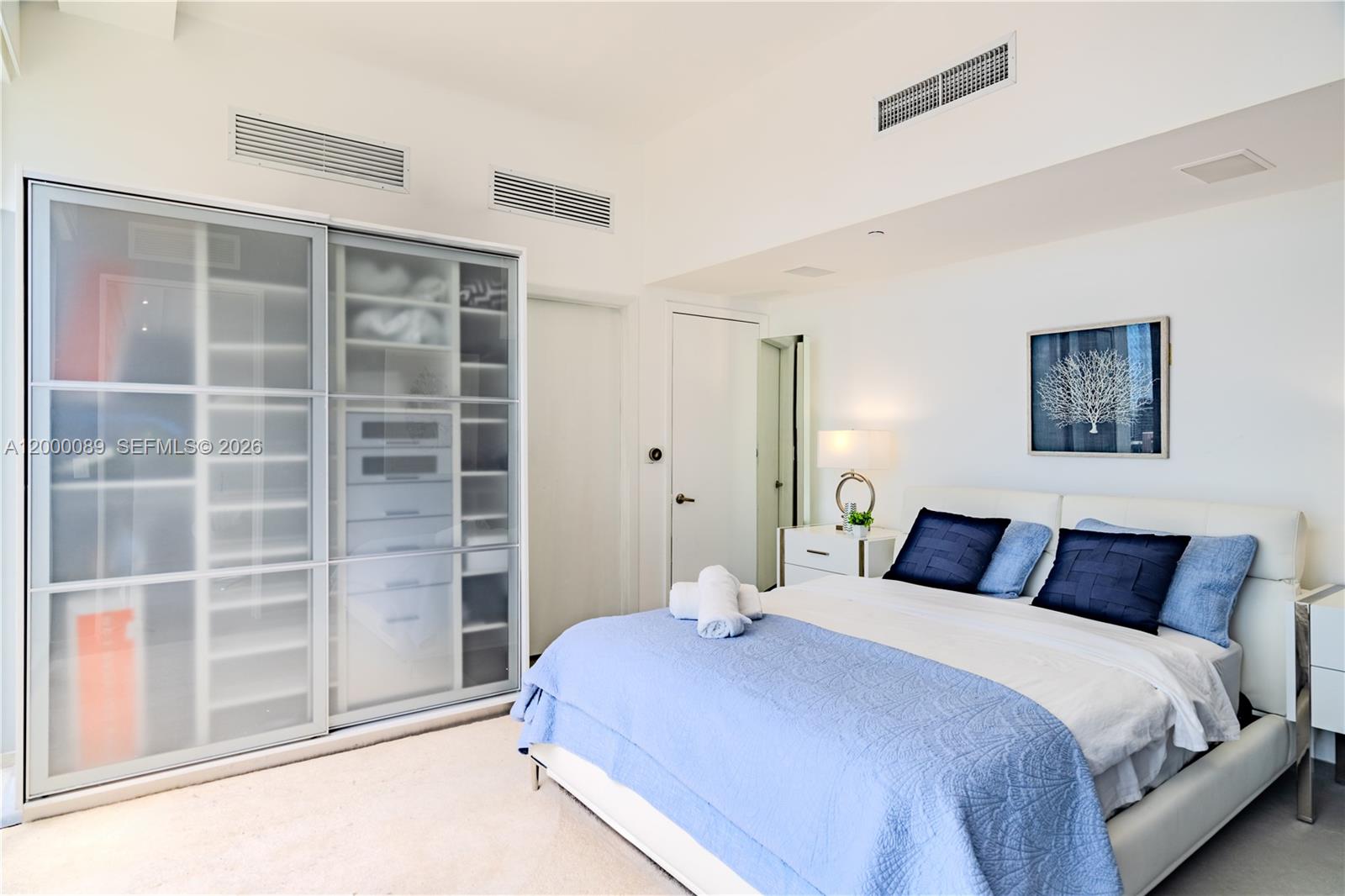 495 Brickell Avenue, Unit PH5703 Miami, FL 33131 - Photo 29 of 52 3rd bedroom upstairs with its own AC and shower.