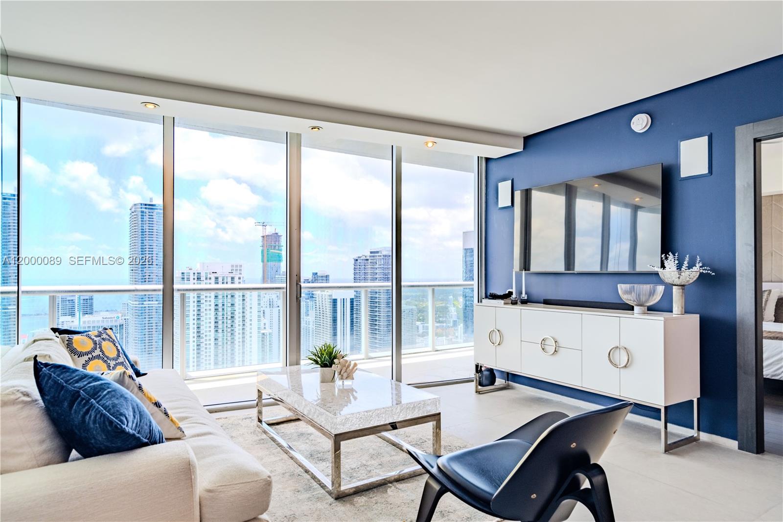 495 Brickell Avenue, Unit PH5703 Miami, FL 33131 - Photo 3 of 52 Living room with ocean view, plenty of sunshine to make your heart dance.