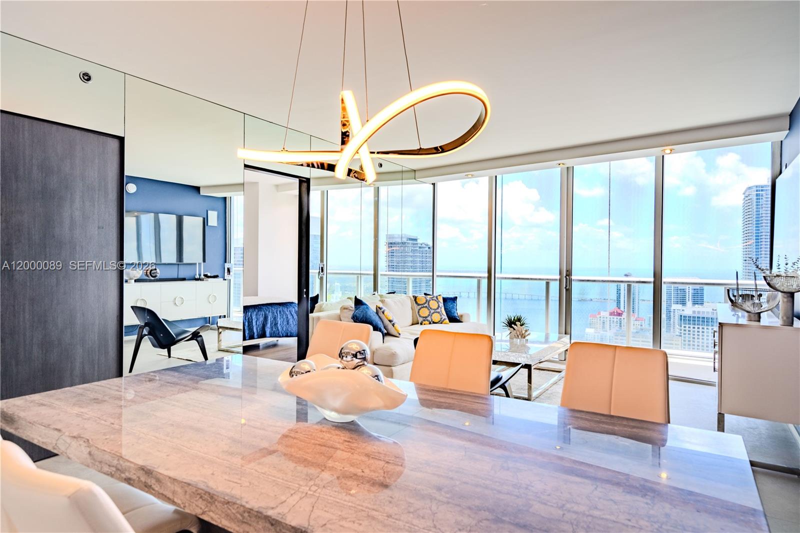 495 Brickell Avenue, Unit PH5703 Miami, FL 33131 - Photo 5 of 52 Open space living with plenty of natural light to open your heart and mind to beautiful Miami ocean views