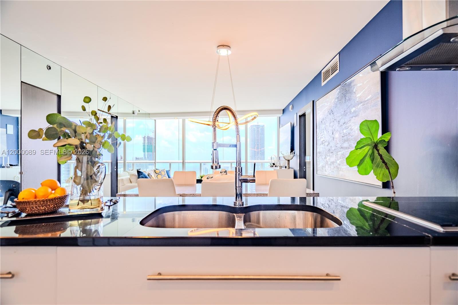 495 Brickell Avenue, Unit PH5703 Miami, FL 33131 - Photo 8 of 52 Kitchen counter with quartz durable brand