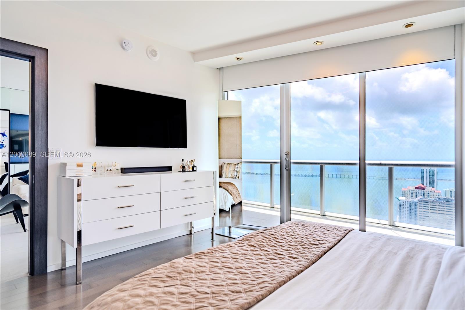 495 Brickell Avenue, Unit PH5703 Miami, FL 33131 - Photo 10 of 52 Master Bedroom with access to balcony