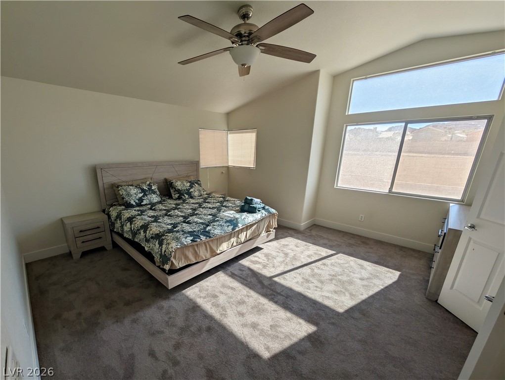 104 Appian Way Henderson, NV 89002 - Photo 16 of 37 Bedroom featuring lofted ceiling, carpet, and a ceiling fan