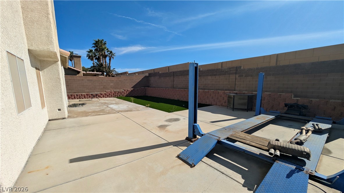 104 Appian Way Henderson, NV 89002 - Photo 19 of 37 Fenced backyard featuring a patio area