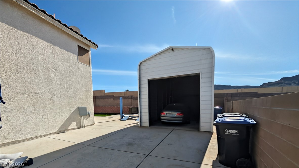 104 Appian Way Henderson, NV 89002 - Photo 20 of 37 Garage with a mountain view