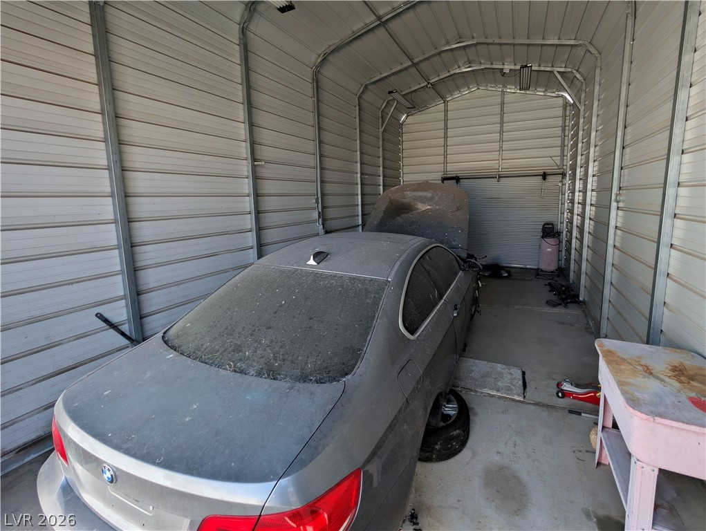 104 Appian Way Henderson, NV 89002 - Photo 21 of 37 Garage with metal wall and heating fuel