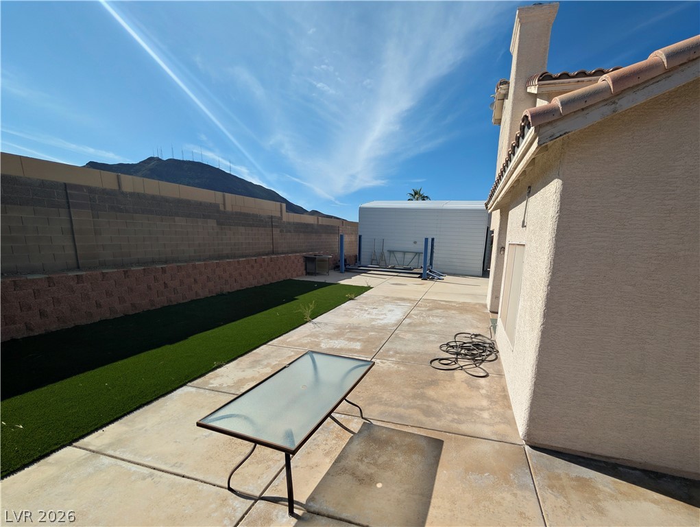 104 Appian Way Henderson, NV 89002 - Photo 24 of 37 Fenced backyard with a patio