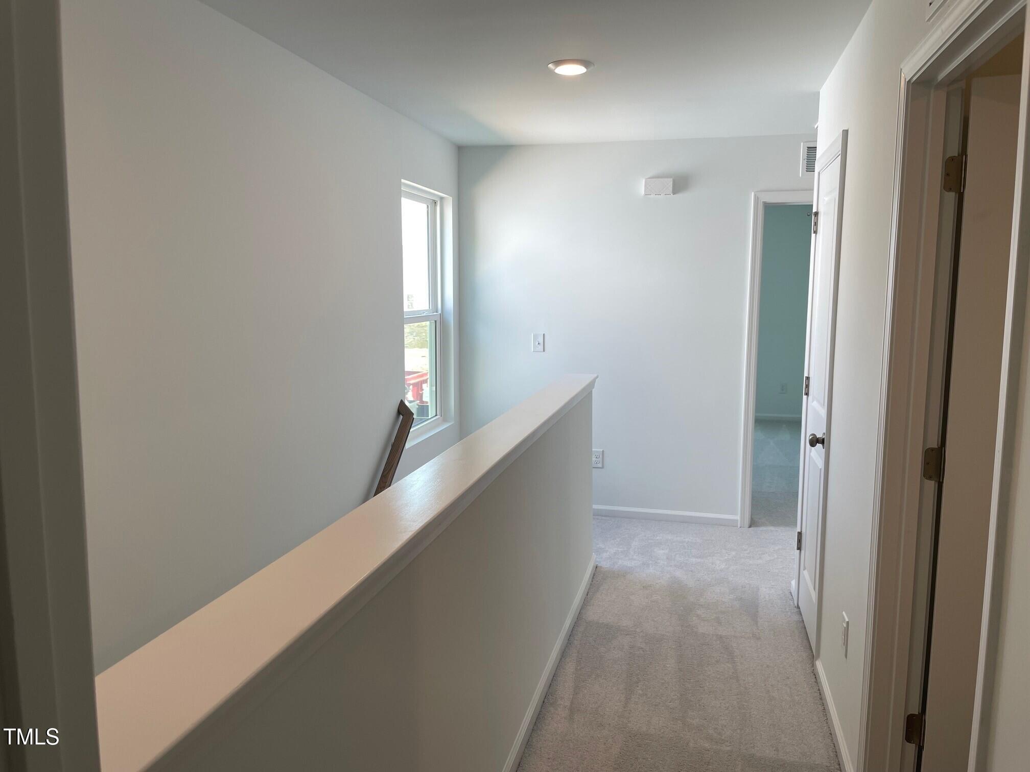 3019 Vitner Drive Durham, NC 27704 - Photo 12 of 20 a view of hallway with stairs