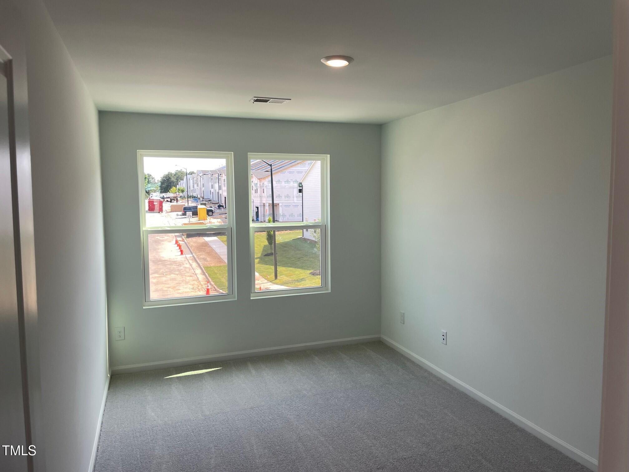 3019 Vitner Drive Durham, NC 27704 - Photo 17 of 20 an empty room with windows