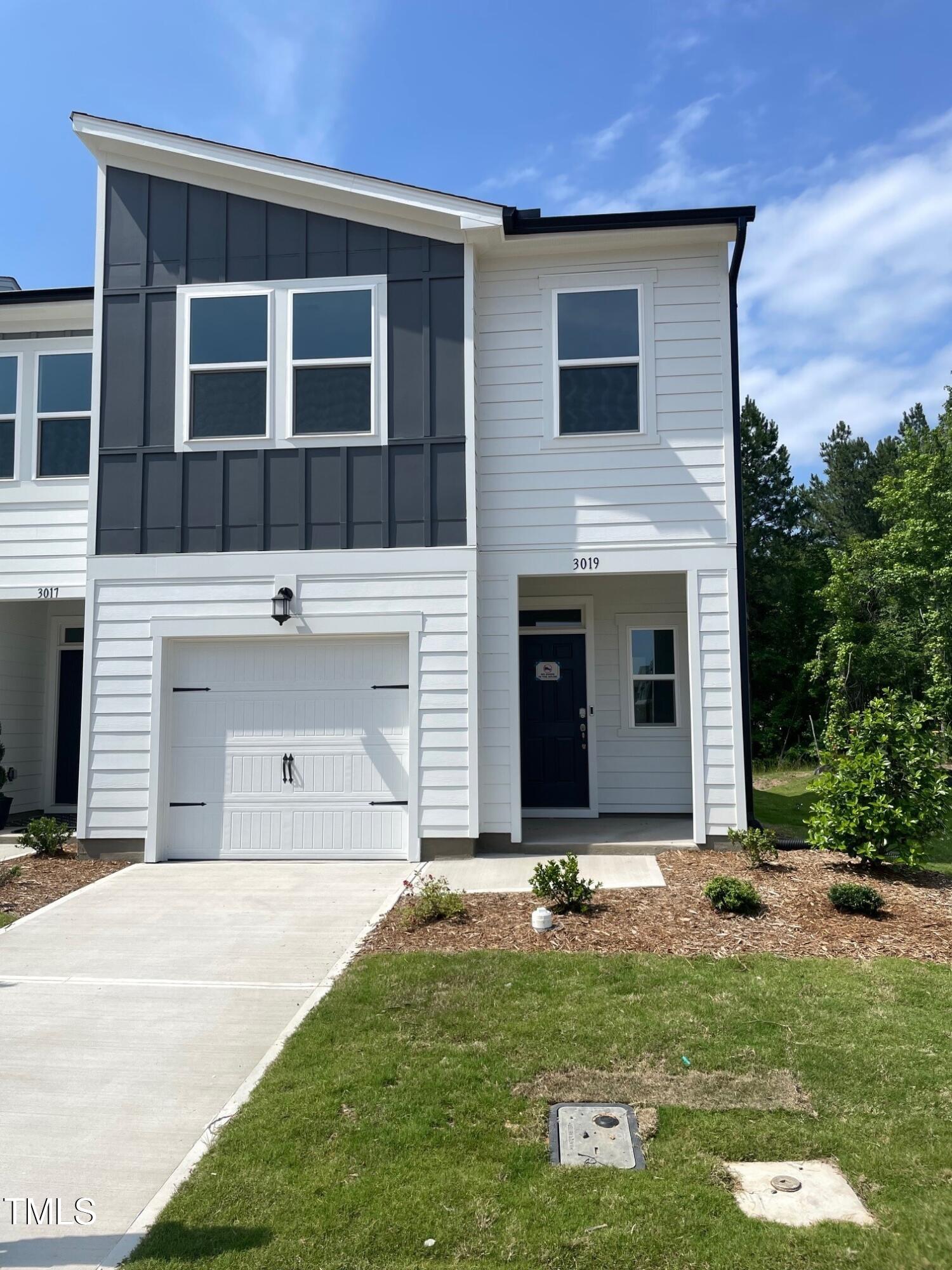 3019 Vitner Drive Durham, NC 27704 - Photo 2 of 20 a view of a house with a yard