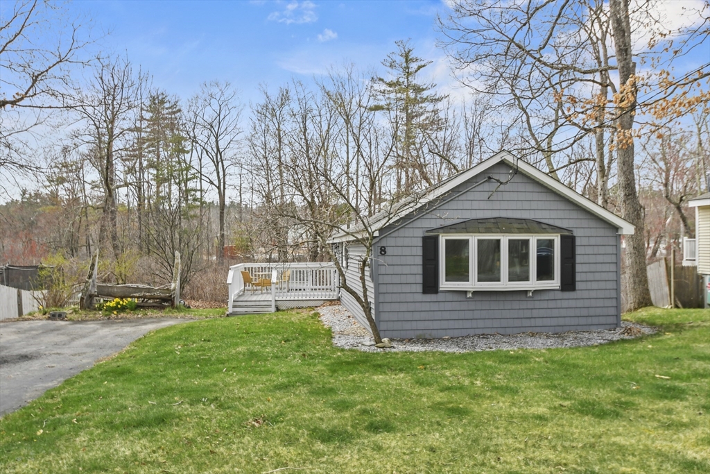 8 Hitty Road Salem, NH 03079 - Photo 2 of 26 a front view of a house with a yard