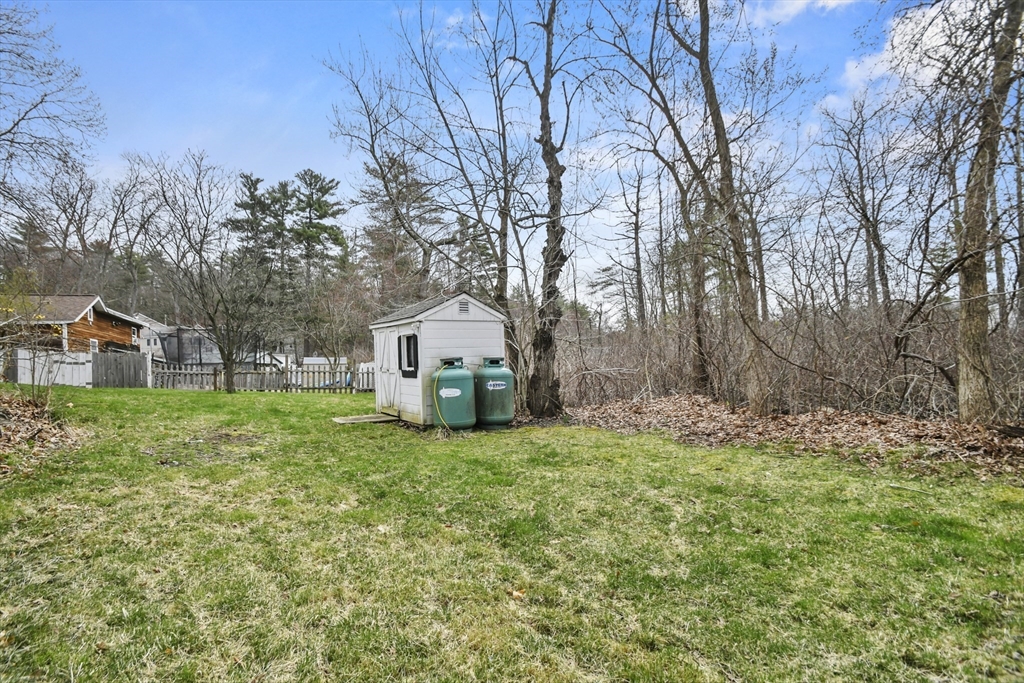 8 Hitty Road Salem, NH 03079 - Photo 23 of 26 a view of a house with a yard