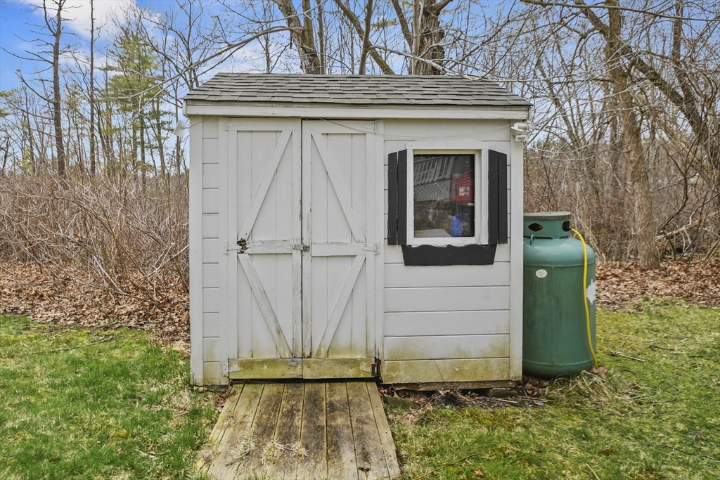 8 Hitty Road Salem, NH 03079 - Photo 25 of 26 a front view of a house with garden