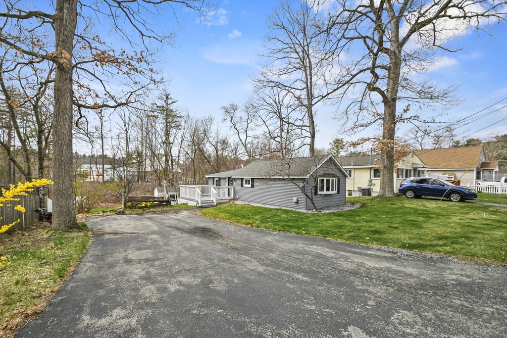 8 Hitty Road Salem, NH 03079 - Photo 26 of 26 a view of a house with a yard and large trees