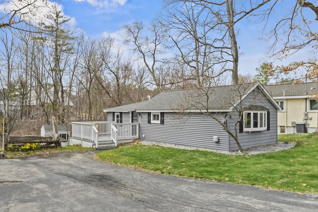 8 Hitty Road Salem, NH 03079 - Photo 3 of 26 front view of a house with a yard