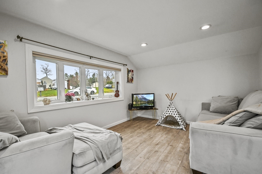 8 Hitty Road Salem, NH 03079 - Photo 5 of 26 a living room with furniture and a large window