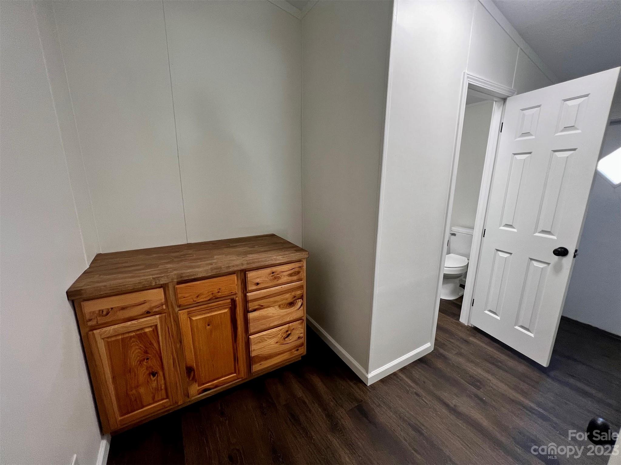 570 Scottdale Road Canton, NC 28716 - Photo 20 of 44 a view of an empty room with wooden floor