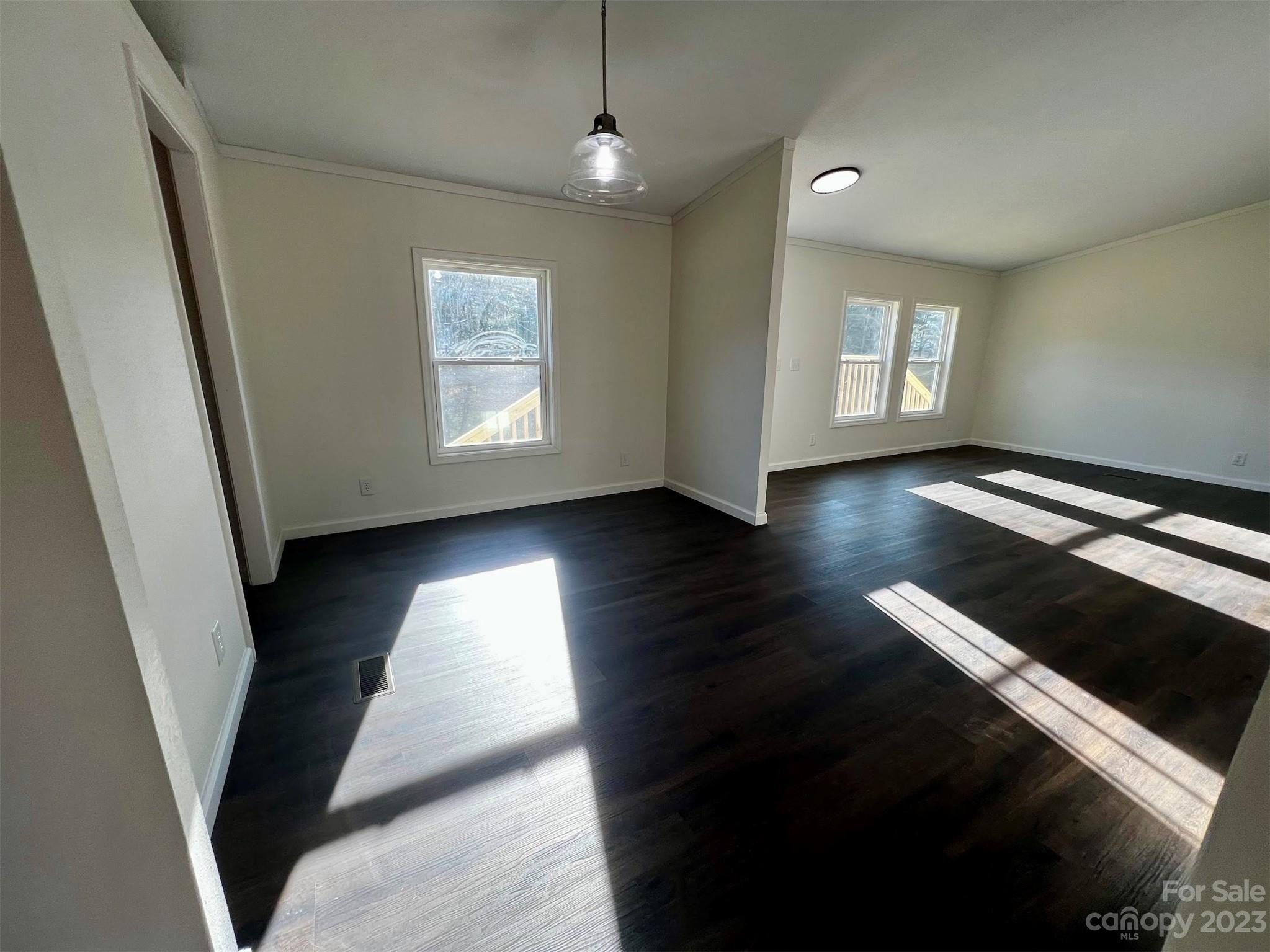 570 Scottdale Road Canton, NC 28716 - Photo 9 of 44 wooden floor in an empty room with a window