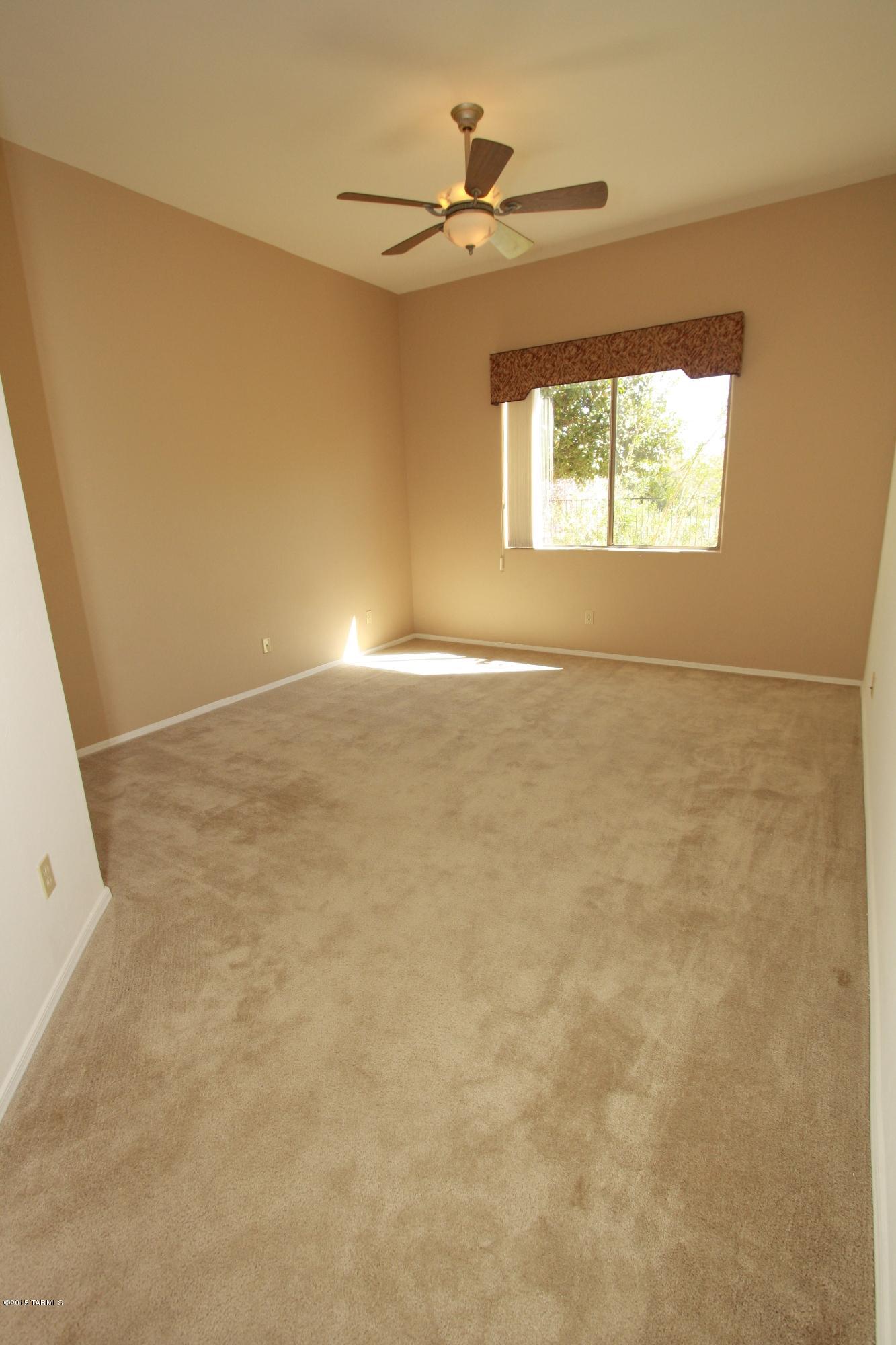5206 North Canyon Rise Place Tucson, AZ 85749 - Photo 13 of 23 Master bedroom has mountain views