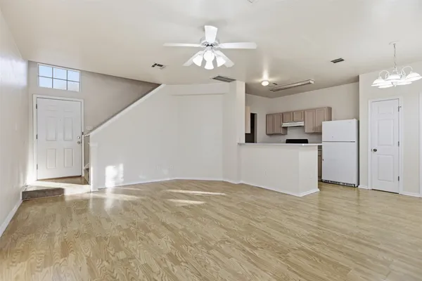 a kitchen with granite countertop a stove and a sink