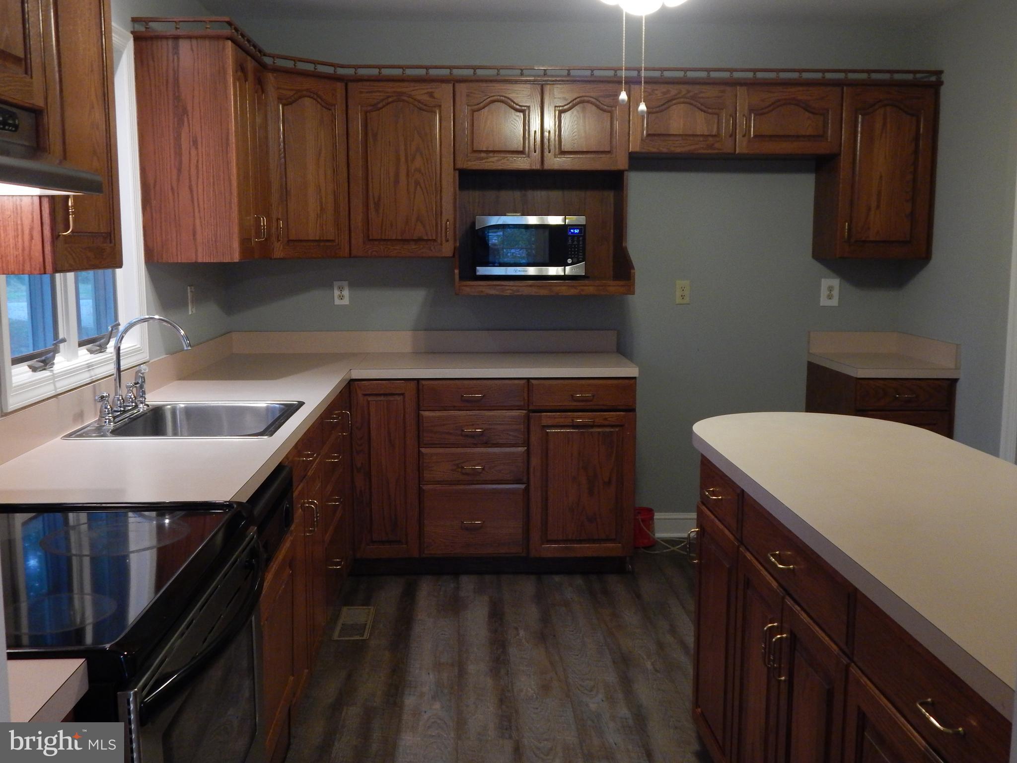 5525 Summit Point Road Charles Town, WV 25414 - Photo 14 of 41 NEW FLOORING AND NEW FRIDGE ON THE WAY!