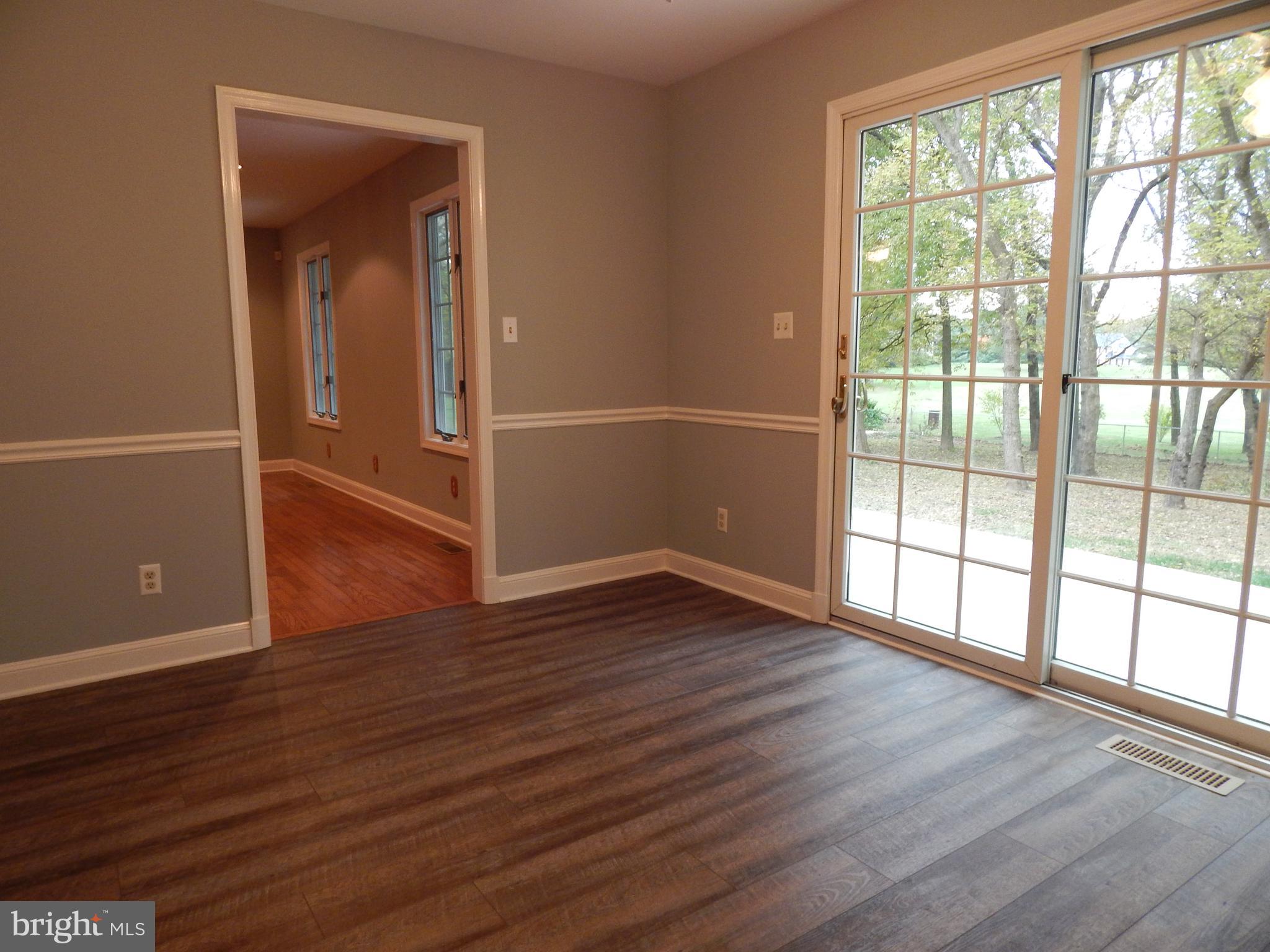 5525 Summit Point Road Charles Town, WV 25414 - Photo 15 of 41 KITCHEN LEADS TO DININGROOM