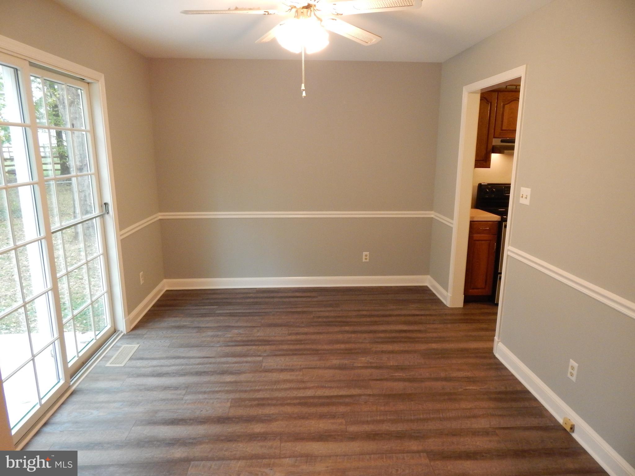 5525 Summit Point Road Charles Town, WV 25414 - Photo 17 of 41 NEW PAINT AND FLOORING HERE AS WELL