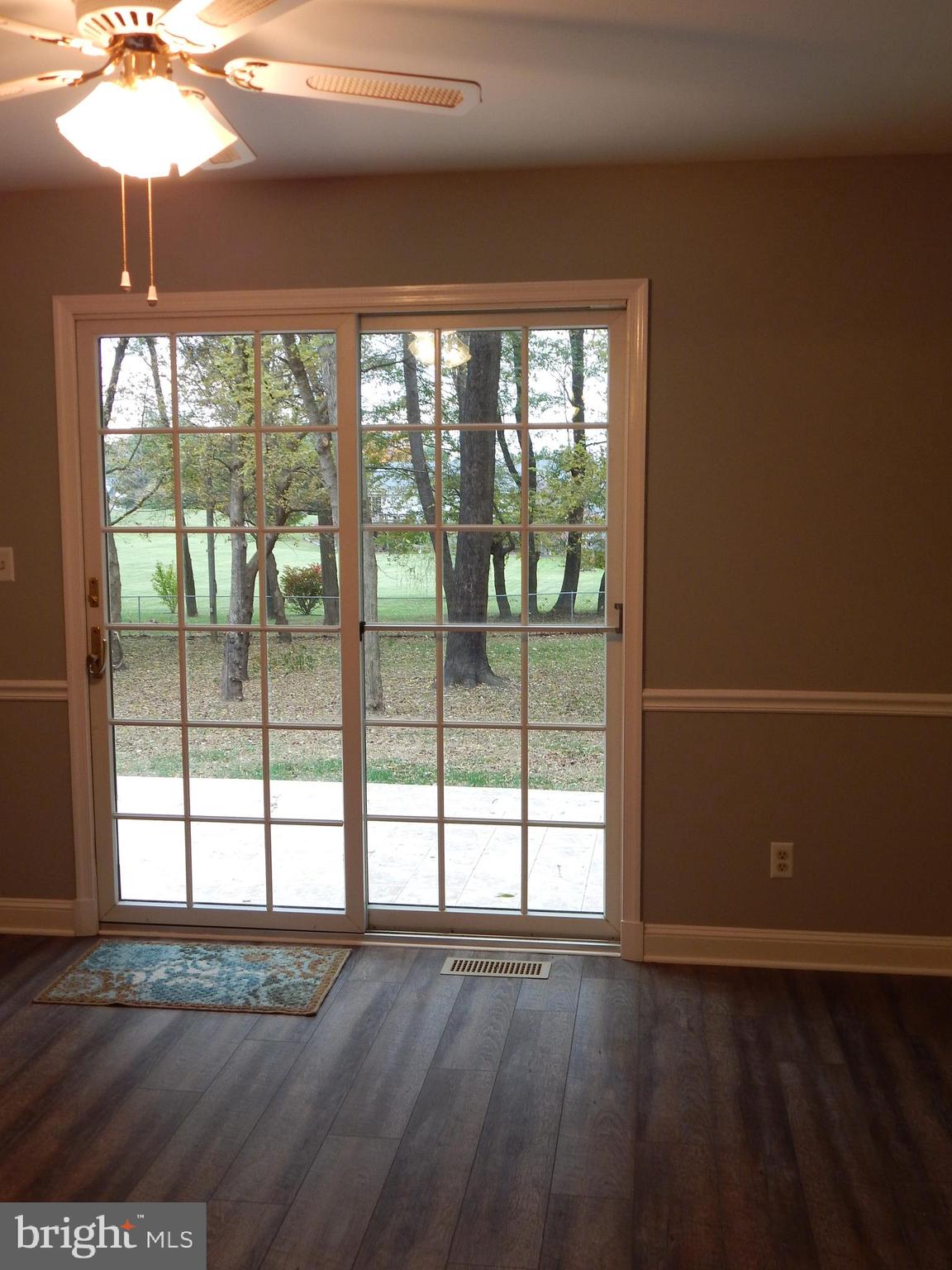 5525 Summit Point Road Charles Town, WV 25414 - Photo 18 of 41 DINING ROOM OPENS OUT ONTO ...