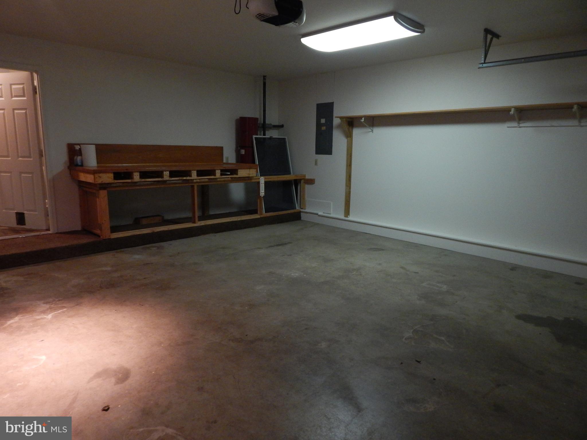 5525 Summit Point Road Charles Town, WV 25414 - Photo 28 of 41 WITH A WORKSHOP AREAA, ND DOGGIE DOOR