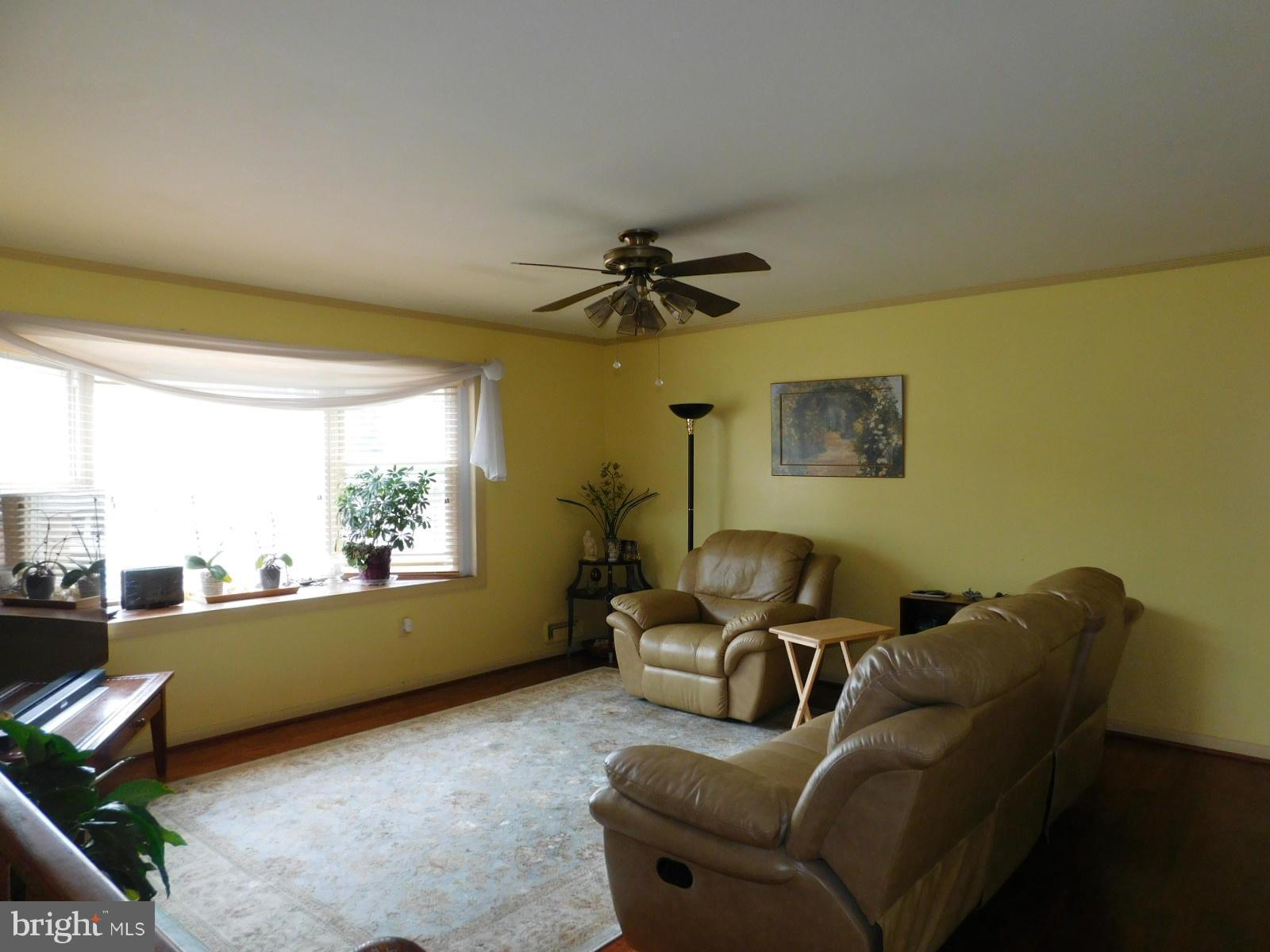 6301 Gormley Place Springfield, VA 22152 - Photo 6 of 21 Living Room -Hardwood floors ( nice view)
