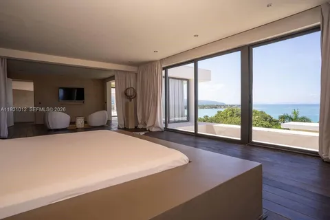a view of a dresser with wooden floor