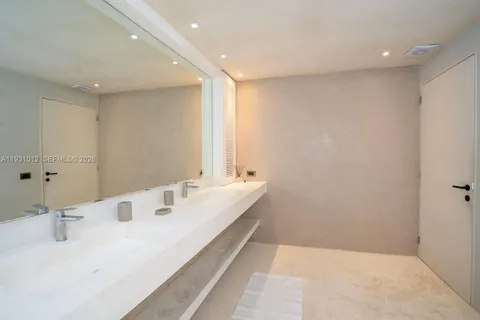 a room with a bed and a window