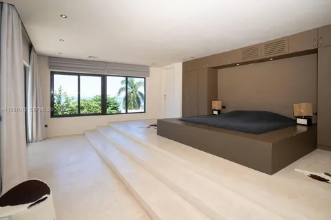a bathroom with a double vanity sink and mirror