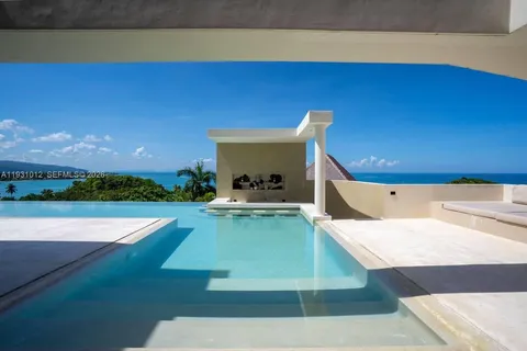 a view of a swimming pool with a patio